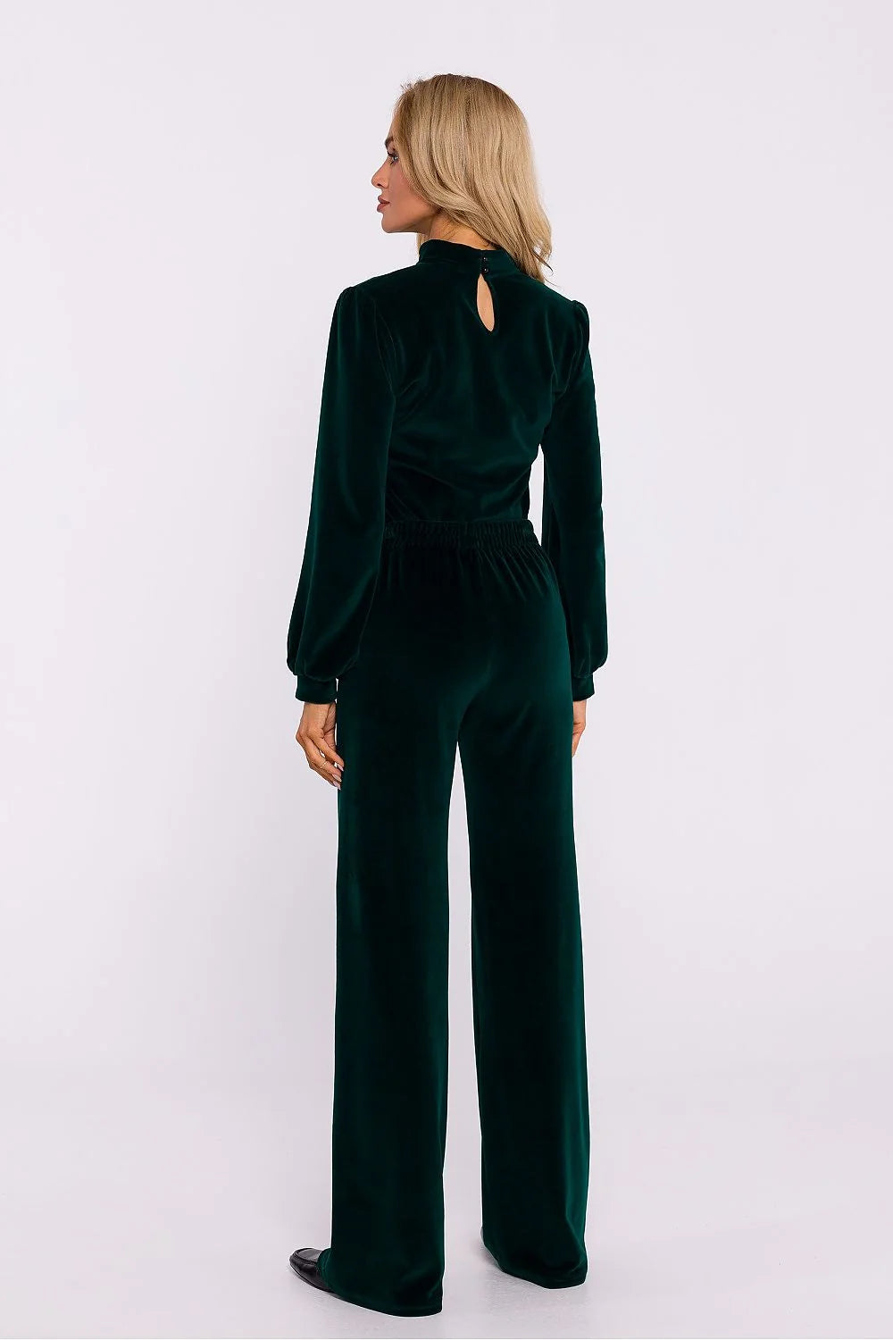 Ensemble femmes haut et pantalon velours vert émeraude profond coupe élégante manches longues bouffantes taille haute