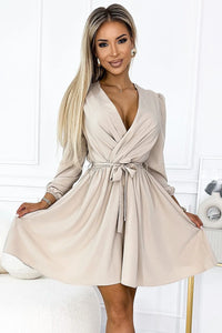 robe cocktail beige cachecoeur manches longues bouffantes poignets élastiques ceinture nouée taille cintrée jupe évasée plis tombé fluide élégante femme