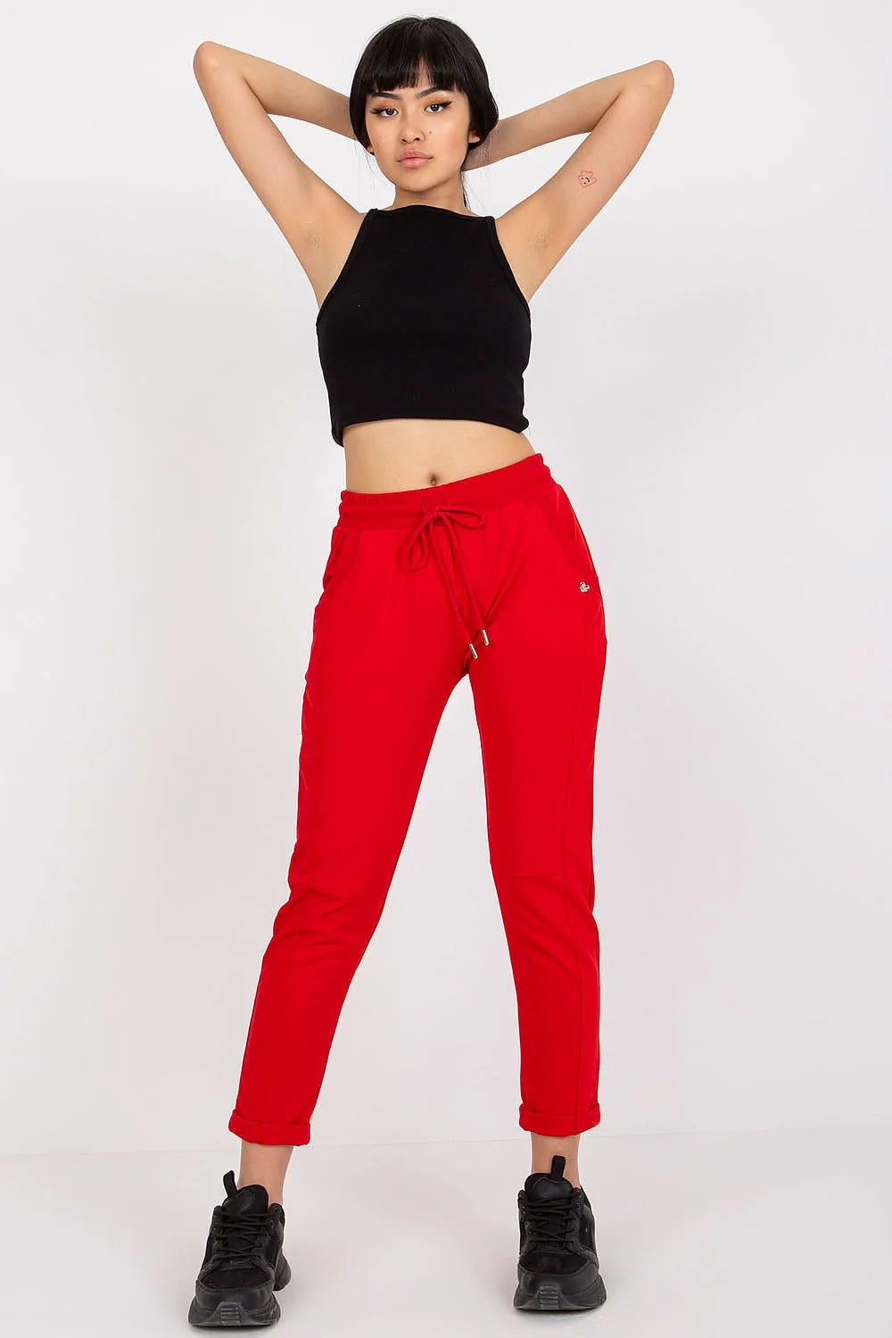 pantalon survêtement femme fuchsia vif taille haute élastique cordon serrage embouts métalliques slim fuselé cheville poches latérales stretch