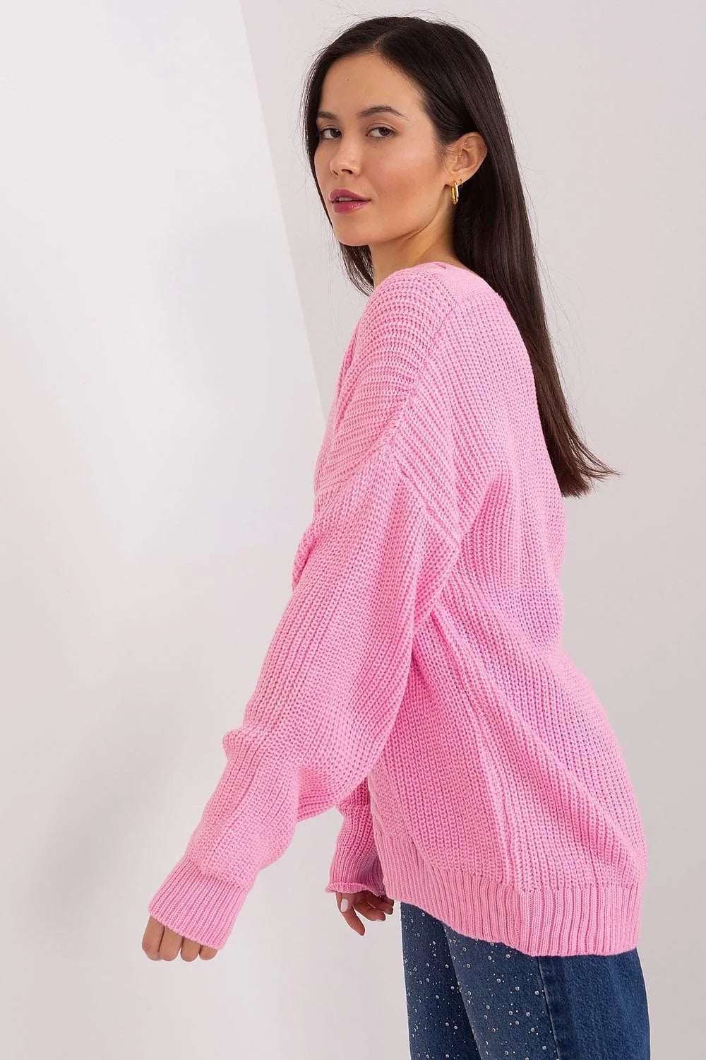 chandail femme rose grosse maille torsadé col V oversize ample manches longues bords côtelés poignets ourlet tricot épais texture douce