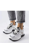 Baskets pour femmes contemporaines blanches et noires cuir synthétique sportswear mode urban style occasion quotidienne