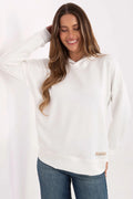 sweatshirt femme blanc oversize coupe ample épaules tombantes manches longues capuche molleton doux ourlets côtelés plaque logo beige