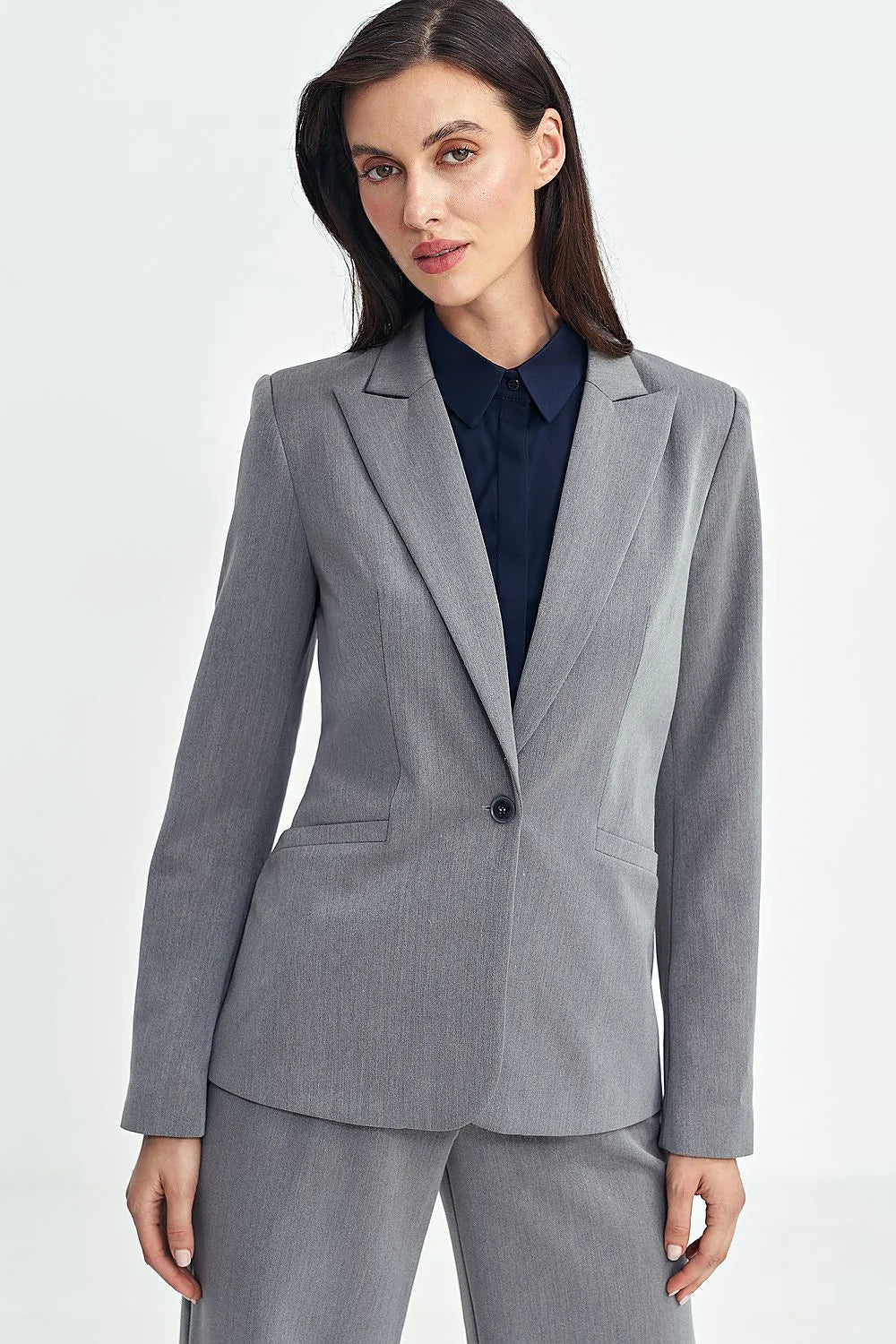 Blazer femme élégant gris clair taille ajustée style professionnel col à revers manches longues poches revers femmes