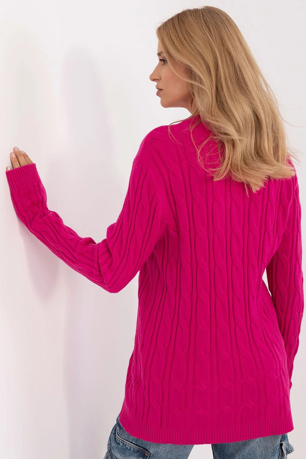 Pull pour femme à torsades coloris fuchsia loose fit manches longues col rond longueur mi-haute