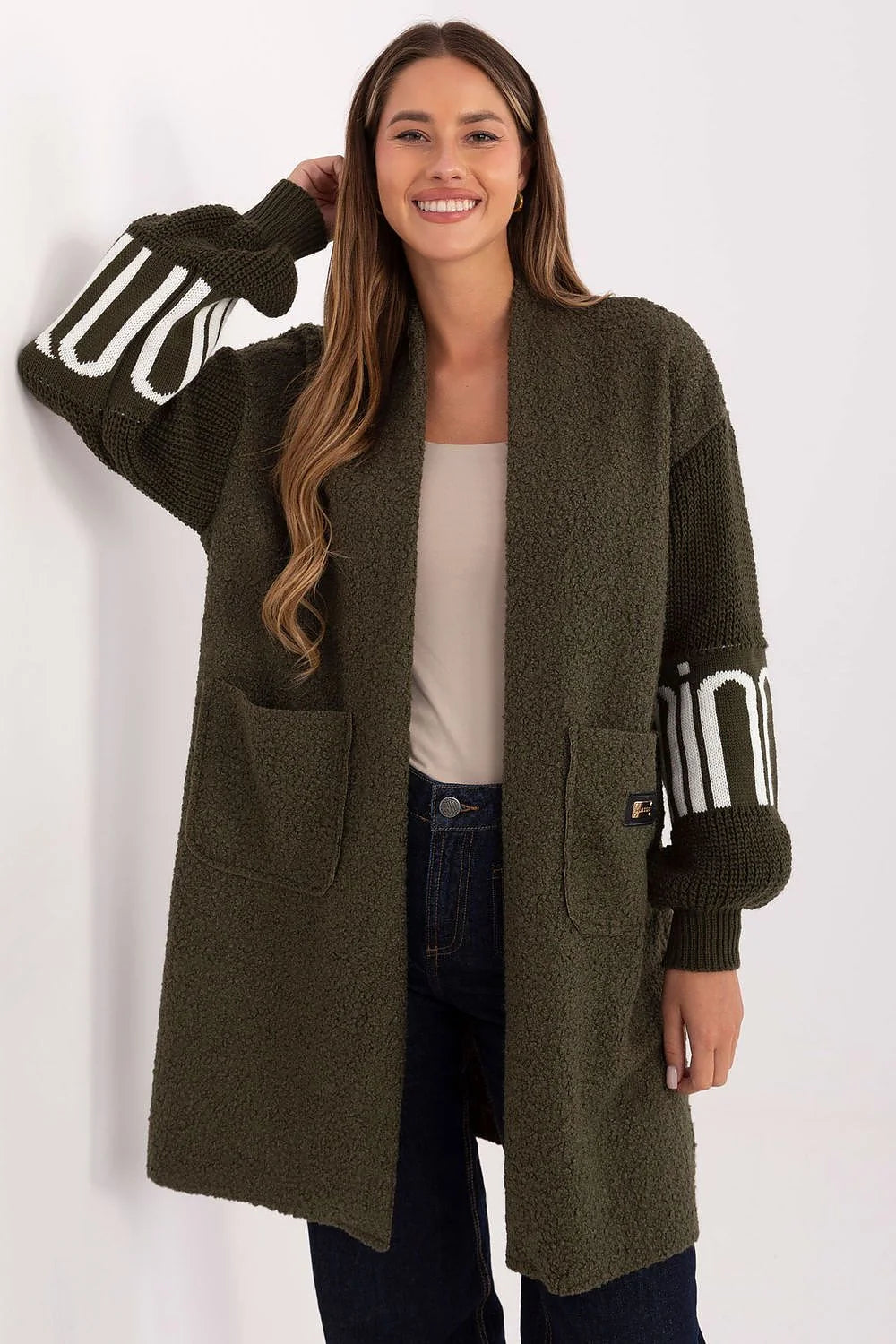 cardigan femme jeté longueur genou manches bouffantes tricot bouclé polyester doux léger confortable texture variée poches insérées