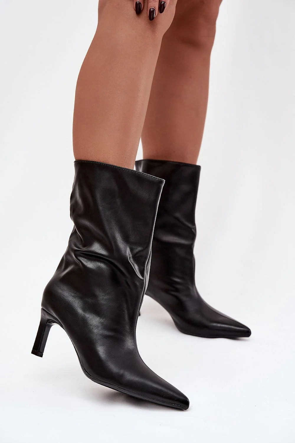 bottes mi mollet femme cuir synthétique noir tige froncée silhouette effilée bout pointu talon mi haut fin