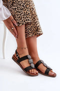 Sandales plates élégantes pour femmes Sergio Leone cuir artificiel noir argenté détails métalliques ajustables talon 1.5 cm