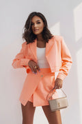 Ensemble féminin élégant La Balancia corail pastel polyester veste structurée jupe courte occasion semi-formelle