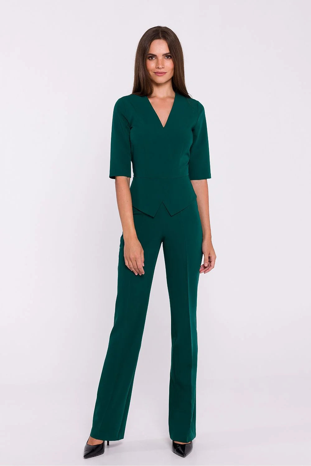 combinaison femme élégante verte émeraude cintrée taillehaute basque décolletéV manches troisquarts pantalon jambedroite évasée tissu fluide extensible sophistiquée