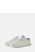 Baskets basses pour femmes style moderne épuré perforées cuir synthétique blanc semelle caoutchouc adhérence doublure bleue