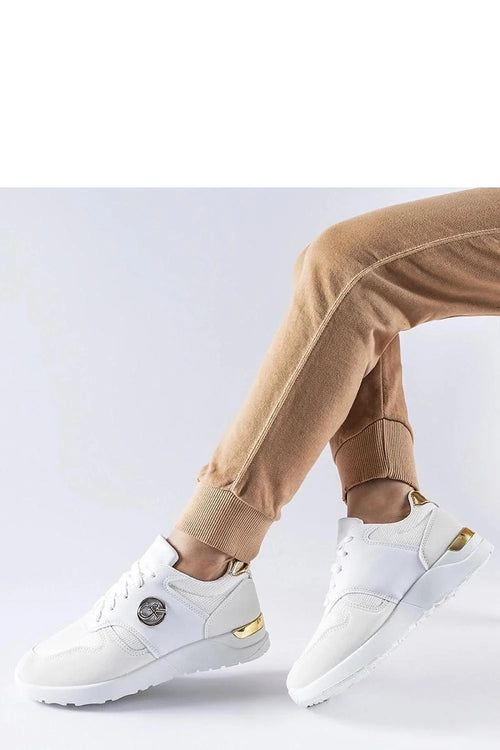 Baskets femmes design moderne style sport-chic matière synthétique confortable semelle caoutchouc durable lacets ajustables