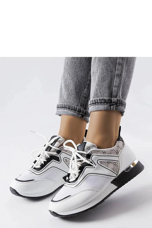 Baskets pour femmes contemporaines blanches et noires cuir synthétique sportswear mode urban style occasion quotidienne