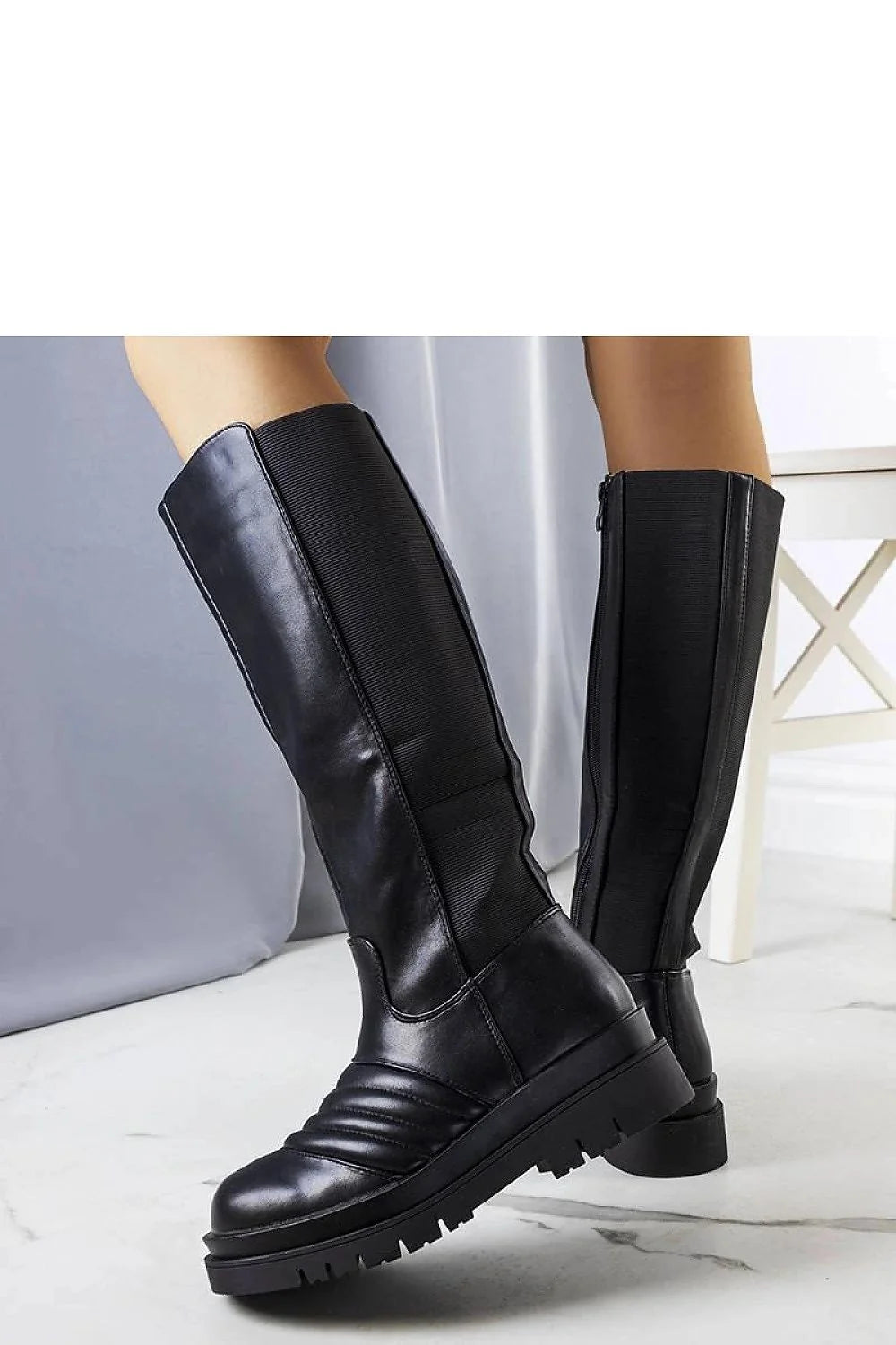 Bottes cuissardes cuir noir moderne audacieux semelle crantée élégance urbaine femmes protection froid