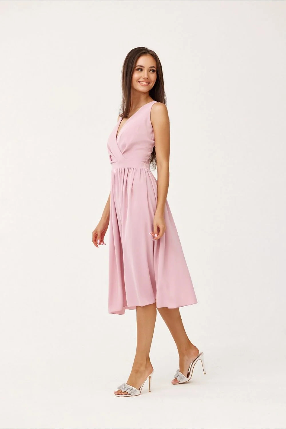 Robe de cocktail élégante cache-cœur sans manches taille cintrée jupe évasée couleur rose pâle polyester 100% femme