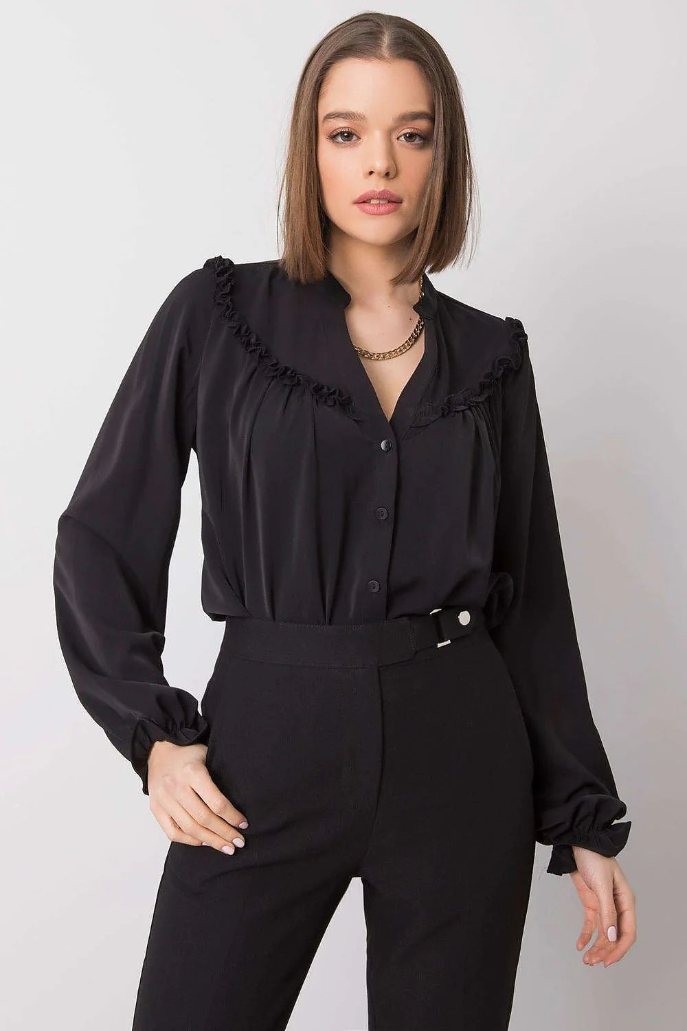 Chemise longue polyester noir élégant volants subtils coupe ample occasions multiples femmes modernes