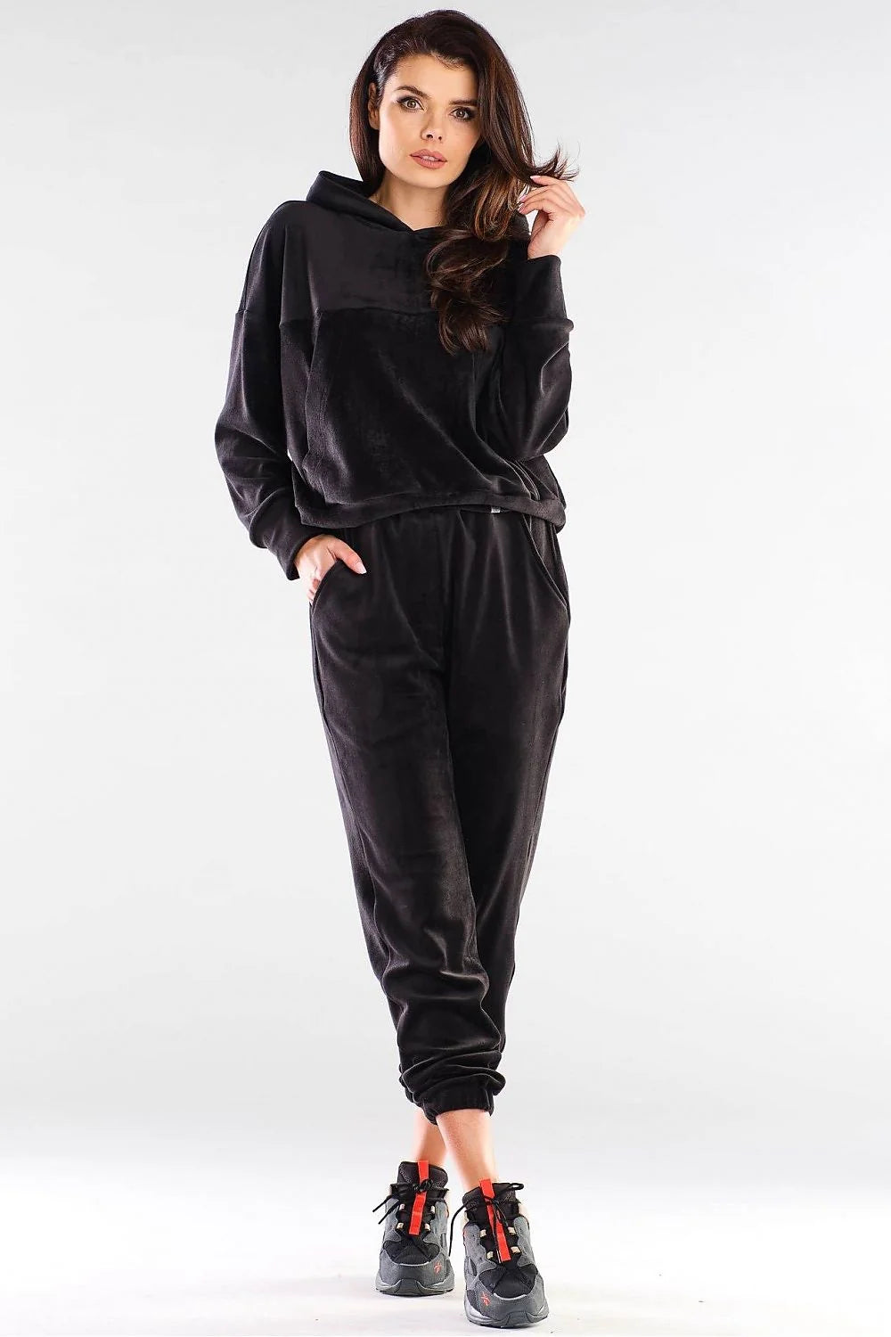 Sweatshirt femme velours rose vif style décontracté chic confortable coupe ample capuche poches pratiques
