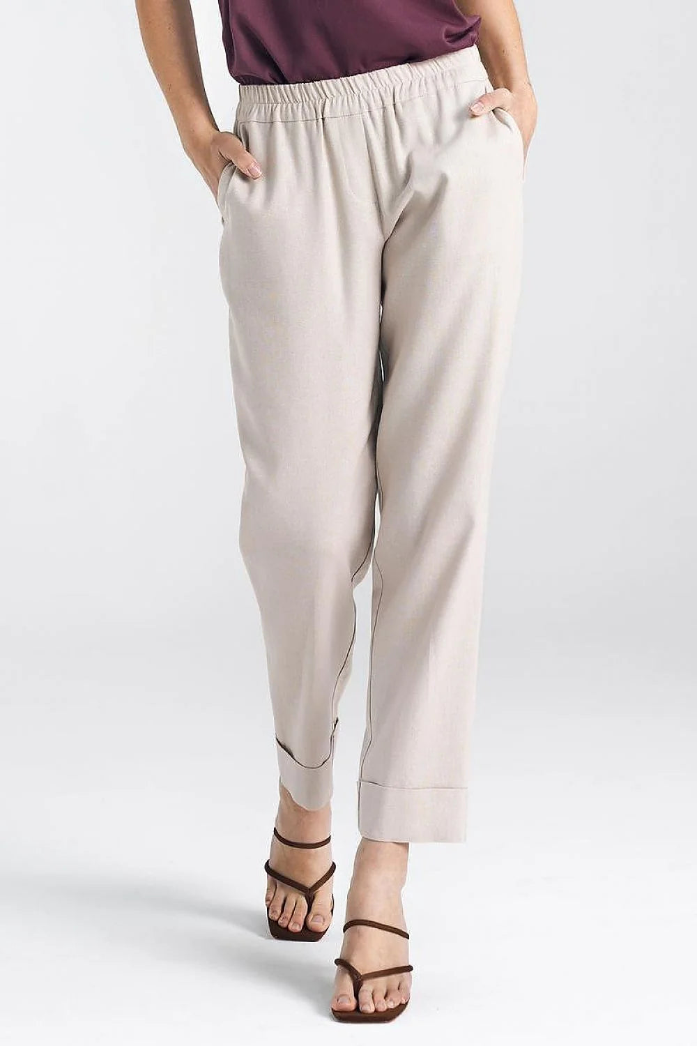 Pantalon femme décontracté coupe droite taille élastiquée coloris beige clair matériaux doux poches latérales occasion quotidienne