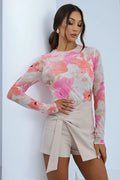 ensemble féminin chic top manches longues mesh floral rose col rond ajusté semi transparent short taille haute structuré ceinture asymétrique