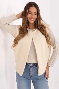 gilet femme sans manches teddy bouclée fausse fourrure ivoire coupe droite longueur hanches poches insérées polyester chaud confortable minimaliste