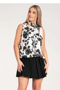 Ensemble femme haut sans manches jupe courte plissée motif floral audacieux style moderne et sophisté
