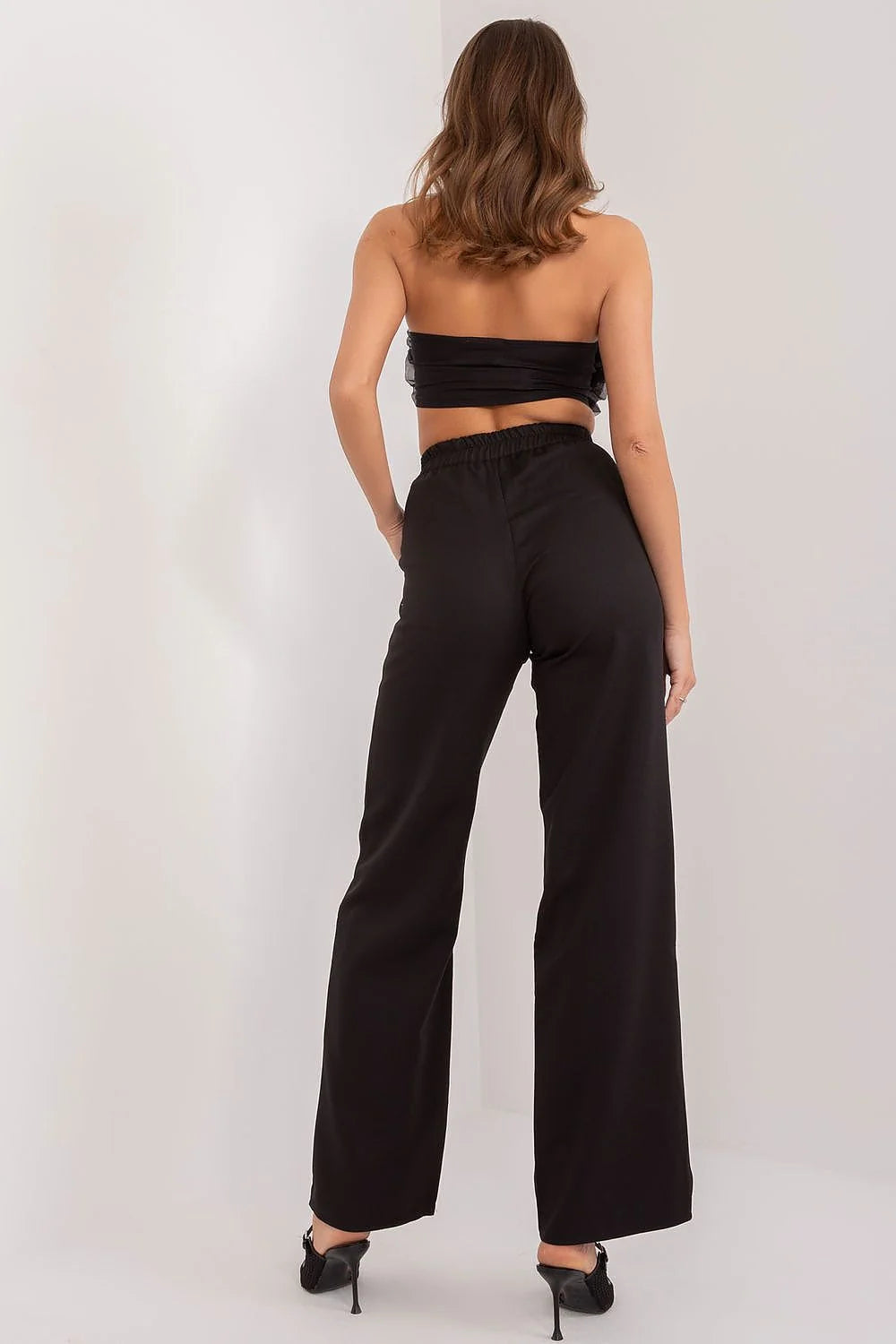pantalon femme Lakerta noir jambes larges taille haute drapé asymétrique bouton visible ceinture crêpe polyester fluide élégant sophistiqué soirée cocktail
