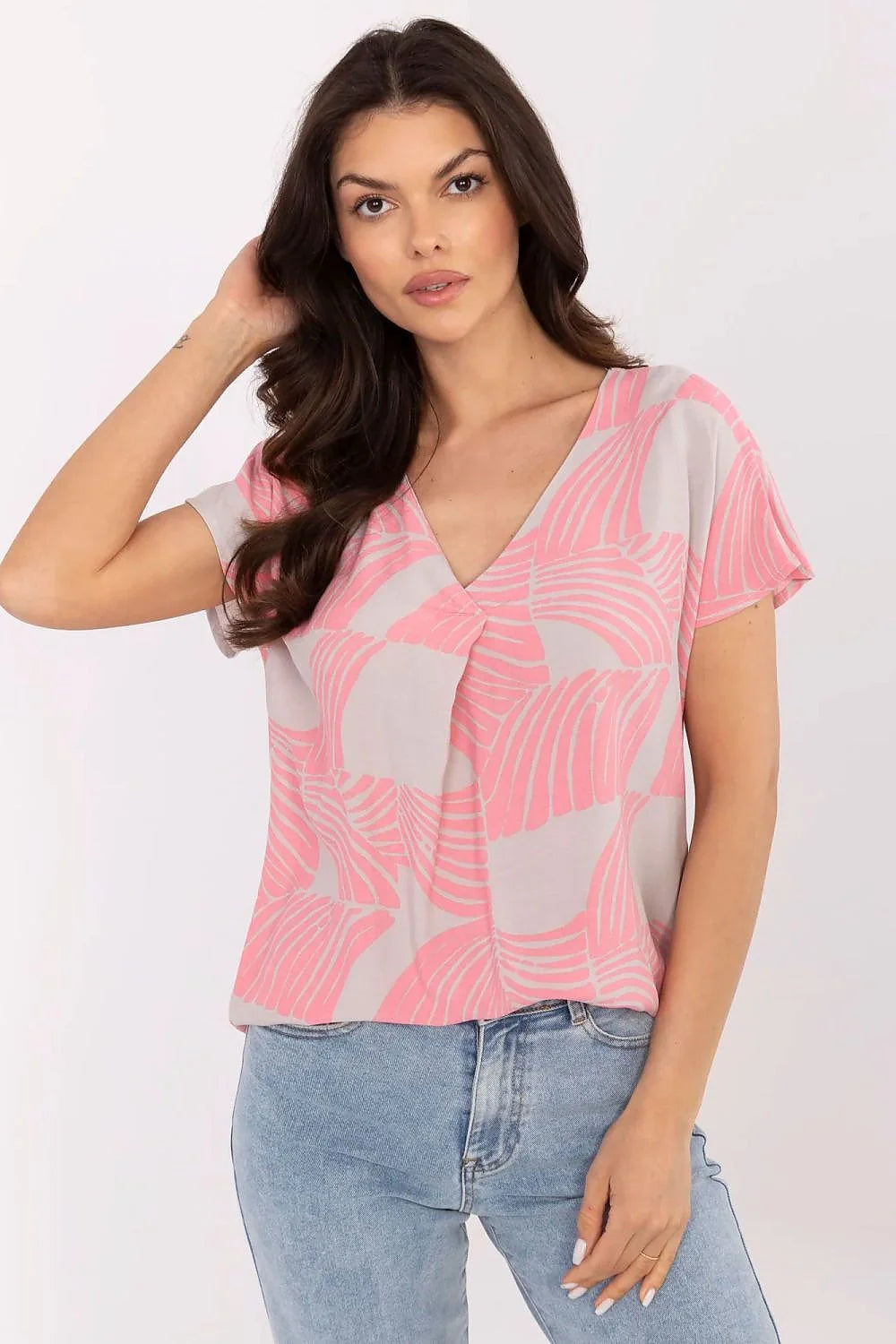Haut pour femme design abstrait motifs ondulés rose clair gris pâle manches courtes encolure V sans fermeture