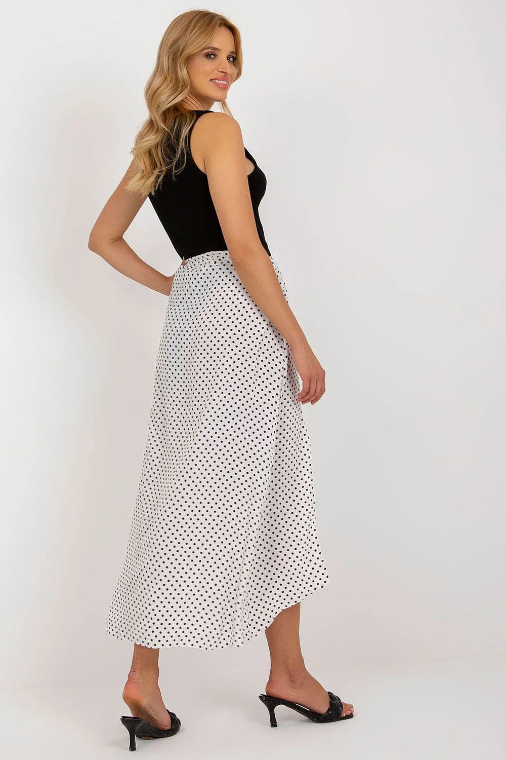 Robe élégante deux-en-un longue asymétrique noire et blanche pois noirs décolleté V sans manches jupe fendue taille ajustable femme