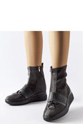 Bottes cothurnes Solea design moderne élégant coupe montante cheville talons compensés confortables matières luxueuses polyvalent femmes