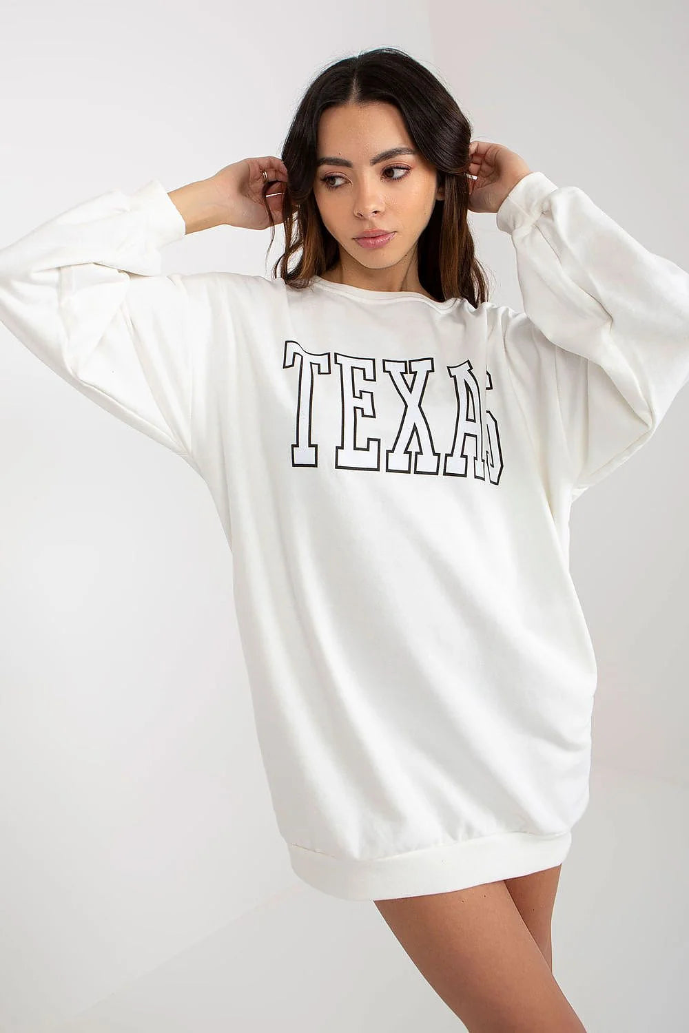 sweatshirt long femme oversize blanc coton molleton doux col rond manches ballon base côtelée inscription TEXAS imprimé noir poches latérales