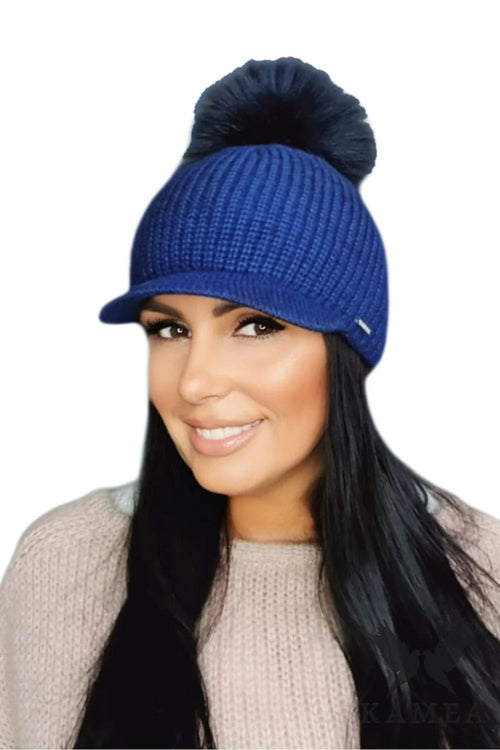 Bonnet d'hiver pour femme style moderne visière bleu marine pompon laine mohair isolation thermique confort froid