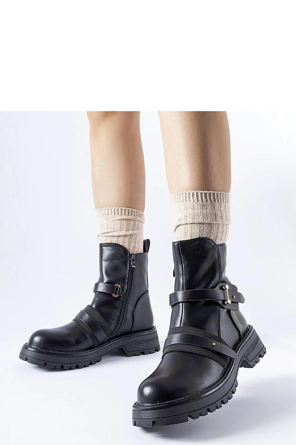 Bottines femmes design moderne élégant cuir noir lisse fermeture éclair métal doré lanières boucles semelle épaisse crantée maintien cheville