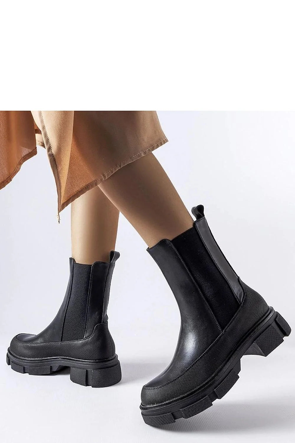 Bottes Chelsea femme style moderne tige montante cuir élastique noir confort adhérence semelle épaisse occasions multiples