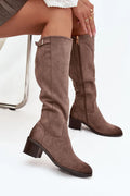 bottes femme mi mollet suédine taupe talon bloc moyen carré bout arrondi fermeture éclair latérale boucle dorée surpiqûres semelle résistante