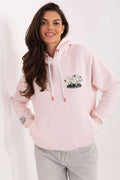 hoodie femme oversize capuche rose pale molleton coton polyester coupe ample manches tombantes poche kangourou imprimé poitrine patch