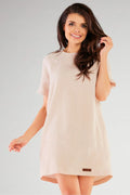 Robe de jour Infinite You robe courte manches courtes tunique fluide nude rose pâle texture gaufrée sans fermeture éclair femme