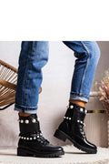 Bottes militaires femmes style robuste contemporain cuir noir perles blanches laces latérales fermeture éclair