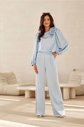 Ensemble élégant femme haut manches longues fleur tissu pantalon taille haute jambes larges style moderne occasion spéciale