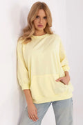 Sweatshirt femme style casual jaune pastel manches 3/4 tissu coton broderie florale poche kangourou