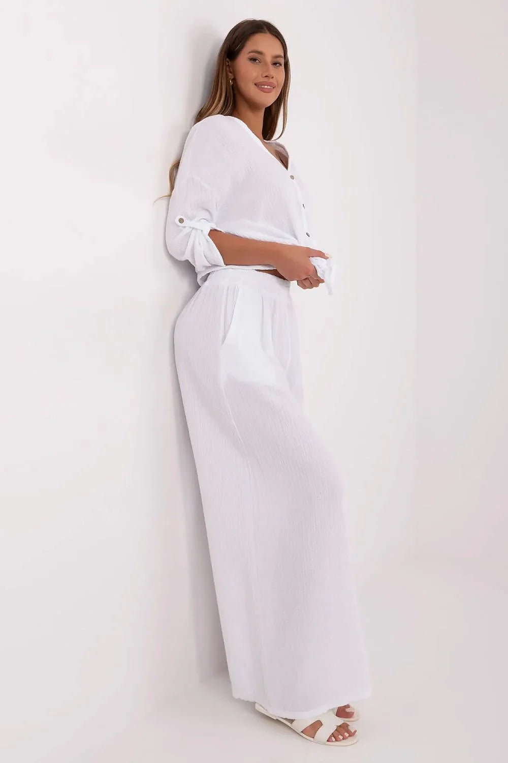 Combinaison femme blanche en coton respirant style décontracté élastique waist poches latérales coupe large manches longues élégante