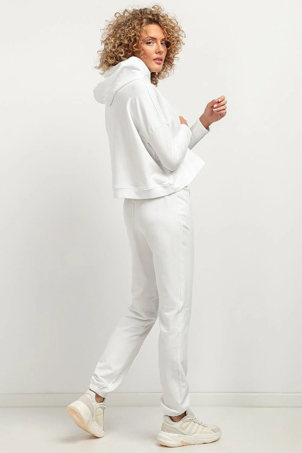 Pantalon survêtement Tessita pour femme, maille douce, coupe ample, élastique taille et jambes, idéal pour détente athleisure