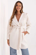 manteau femme mi long ceinturé ivoire crème col châle large manches longues poches latérales coupe droite