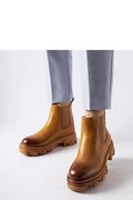 bottines Chelsea cuir lisse marron foncé finition polie design classique panneaux élastiques latéraux semelle épaisse plateforme caoutchouc crantée