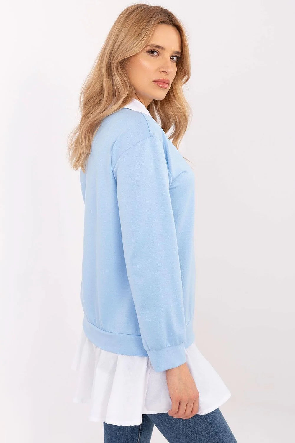 Top féminin design layeré couleur pastel bleu chemisier col manches longues ourlet volanté femme casual chic
