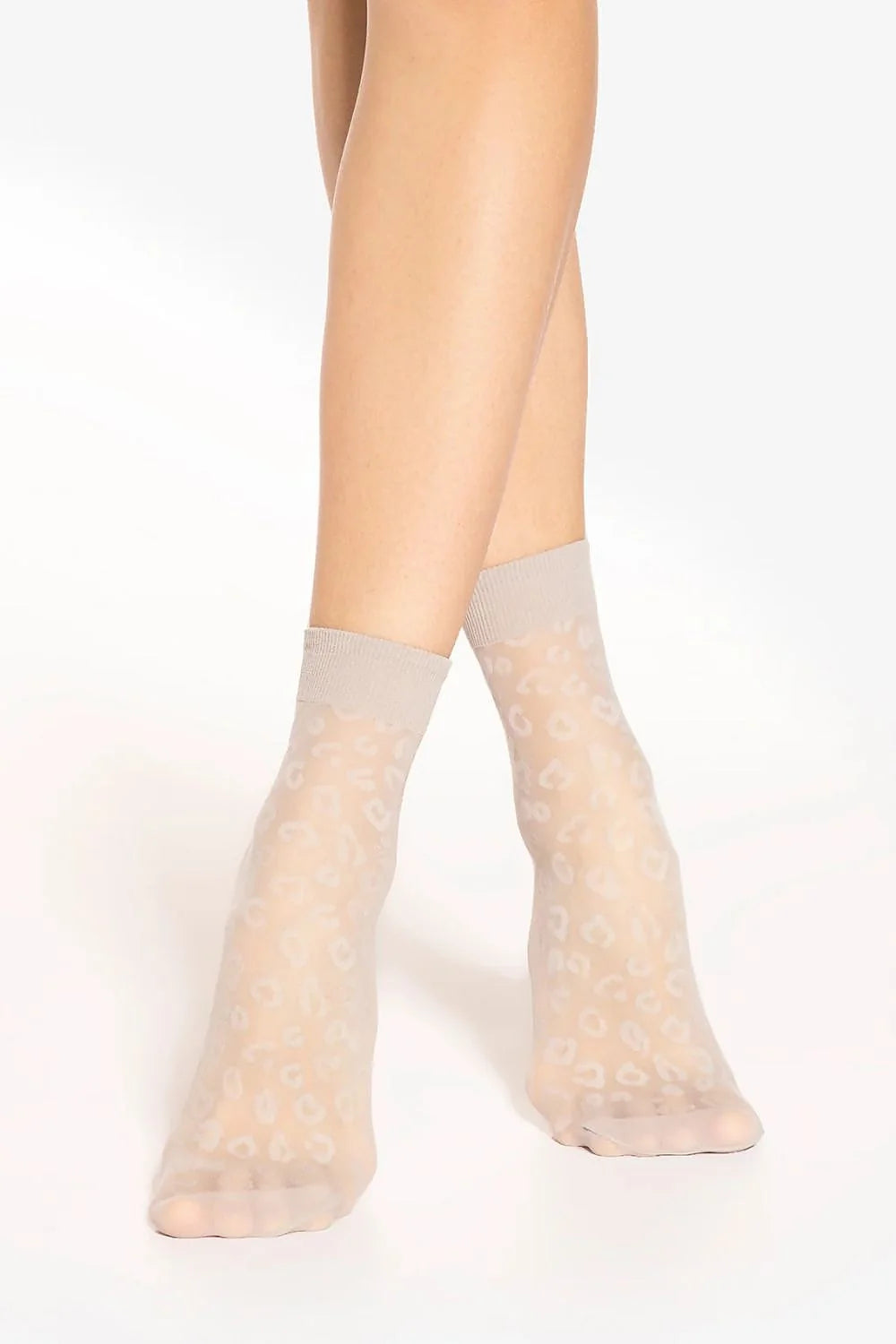 Chaussettes hautes pour femmes, motif léopard, 15 DEN, matière fine et transparente, confort élastique, durabilité renforcée, style élégant et moderne, idéales pour tenues décontractées ou habillées