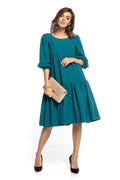Robe élégante en polyester bleu canard manches bouffantes pour style chic et décontracté femmes