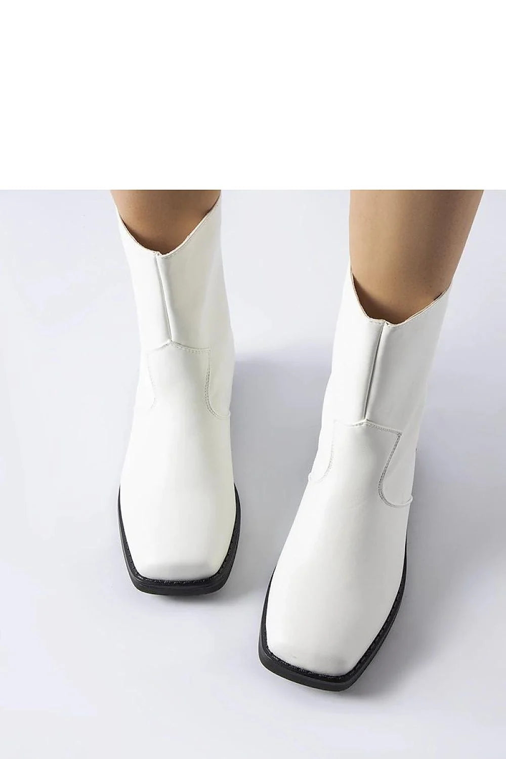 bottes solea femme minimaliste similicuir blanc semelle caoutchouc noir talon bas carré 3cm coupe ajustée discrètes enfilage sans lacets intemporel