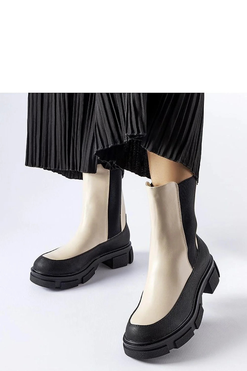 Bottes pour femmes design moderne chic bicolore beige noir Chelsea style semelle épaisse elasticité latérale protection mi-mollet finitions élégantes occasion多种