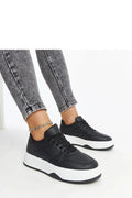 Baskets femme design moderne tendance baskets basses semelle épaisse cuir synthétique noir blanc confort urbain mode décontractée