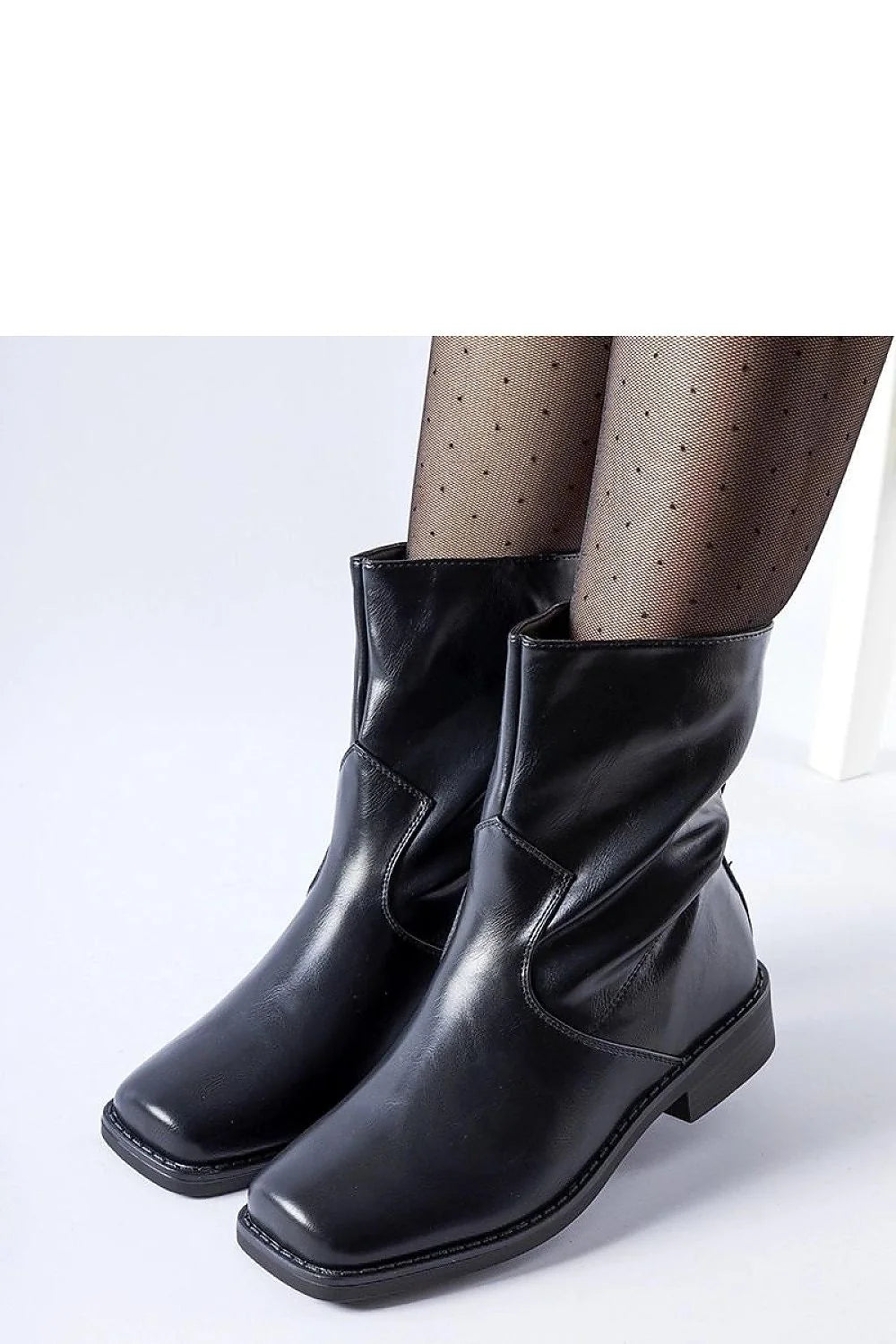Bottines pour femmes design moderne minimaliste mi-hautes cuir noir bout rectangulaire semelle épaisse talon bas