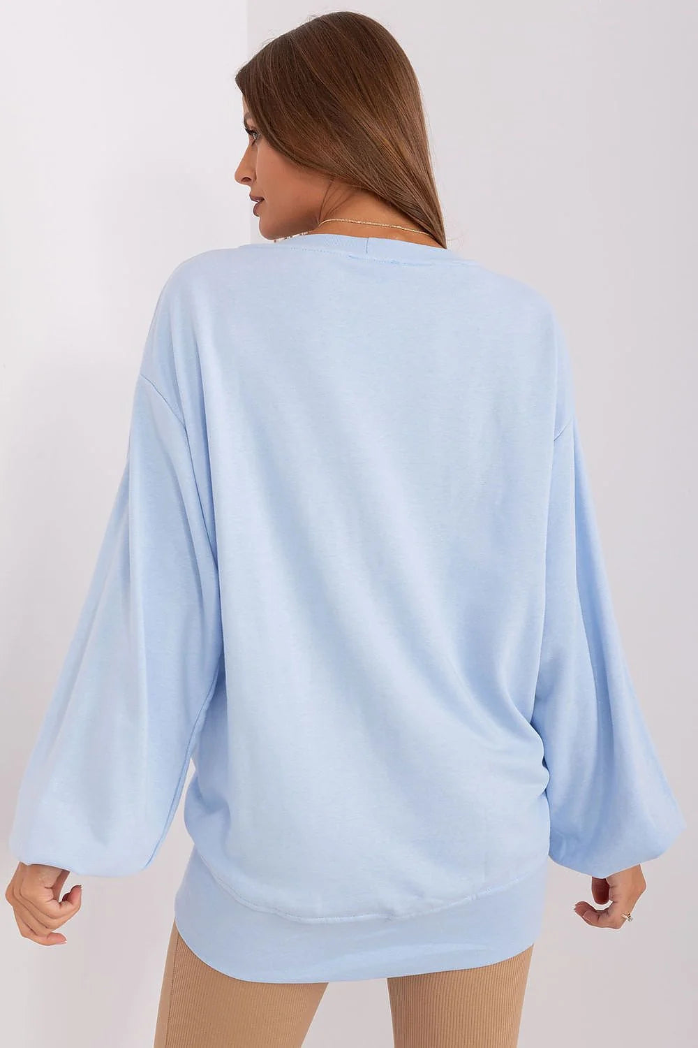 sweatshirt femme oversize col rond manches bouffantes emmanchures tombantes coupe longue décontractée bleu pastel jersey molletonné doux coutures décoratives V